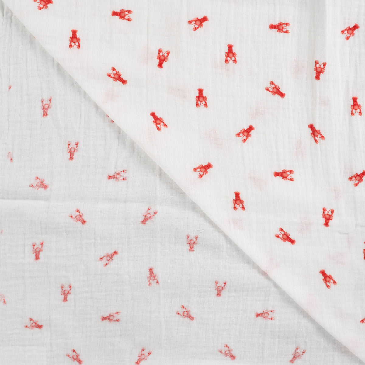 Detailaufnahme von Musselin Off White mit kleinen Hummern