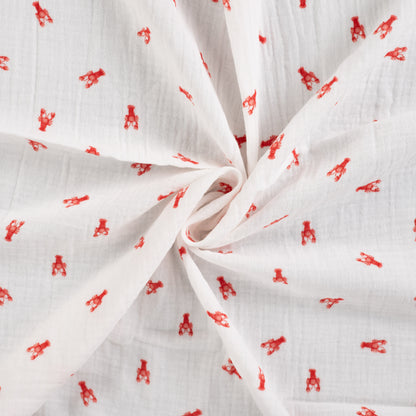 Detailaufnahme von Musselin Off White mit kleinen Hummern