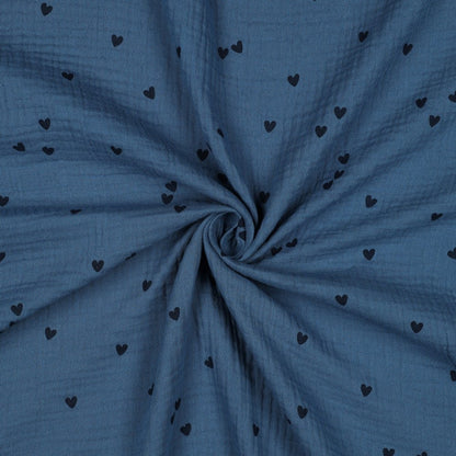 Detailaufnahme von Musselin in Marine mit kleinen Herzen